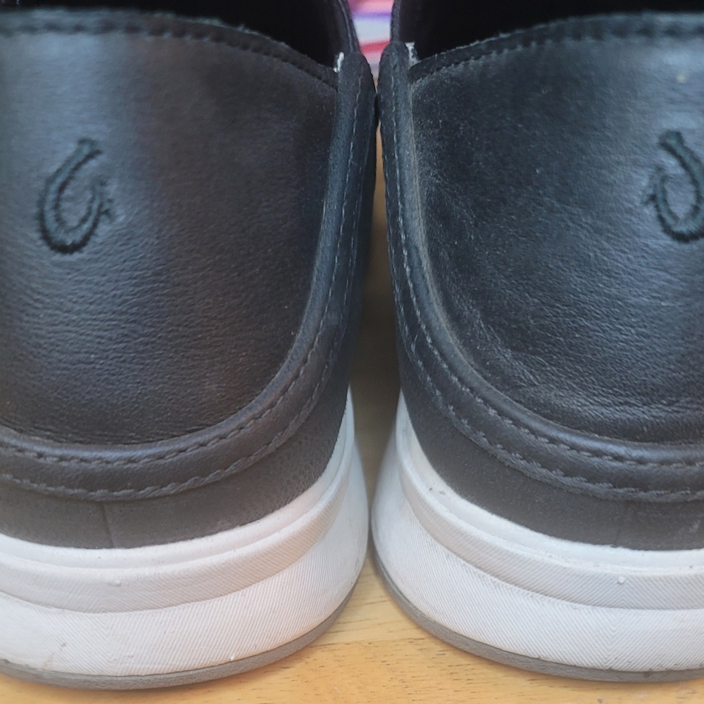 Olukai Black Leather Slip-On Sneakers